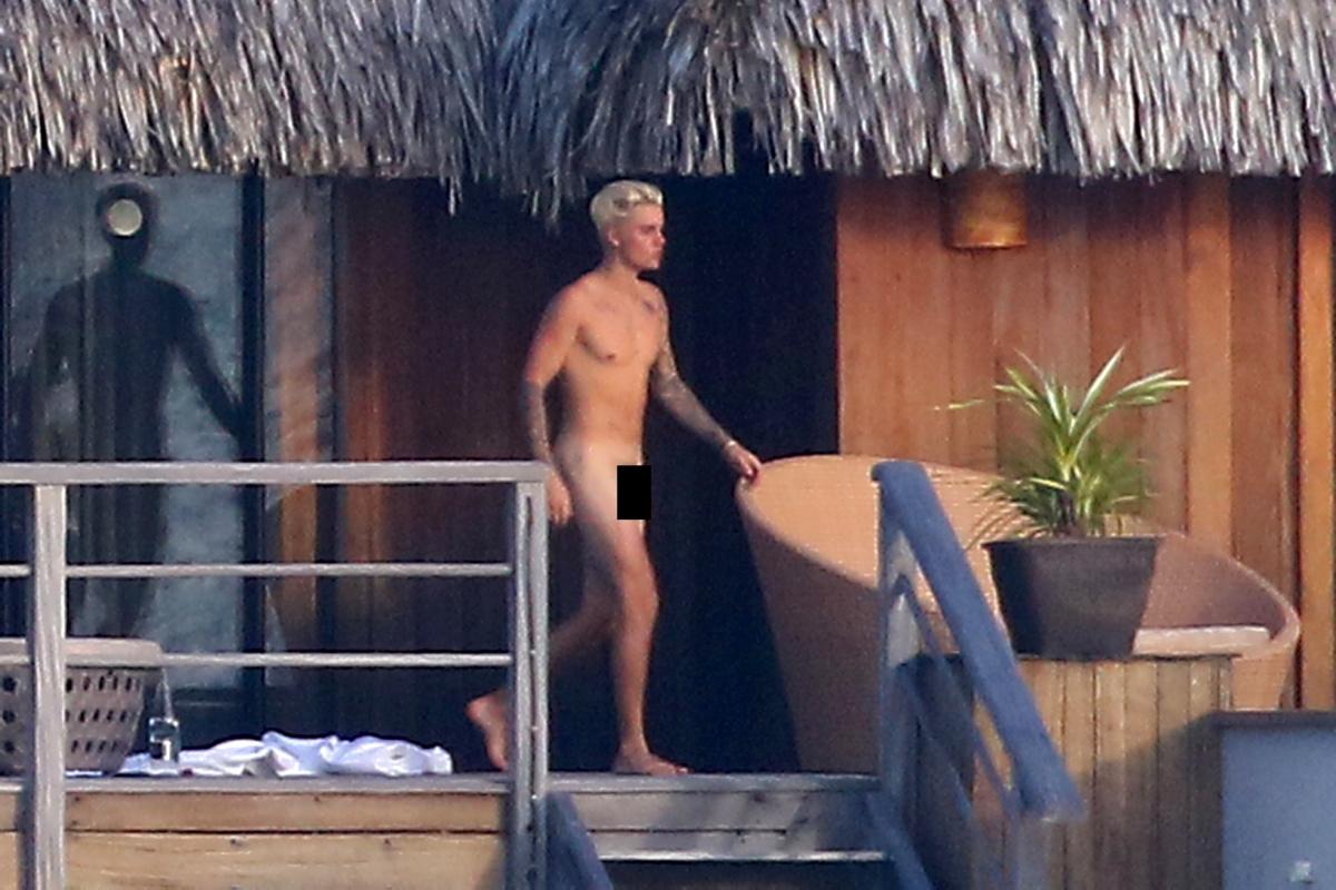 Justin Bieber é clicado nu com bumbum e pênis à mostra durante férias em Bora Bora